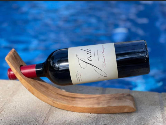 Floating wine bottle holder