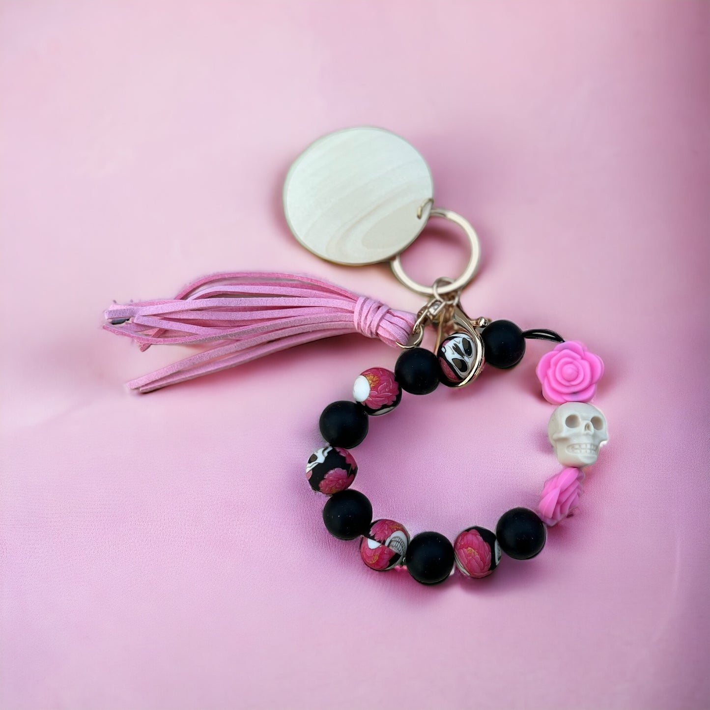 Silicone skull and rose keychain wristlet