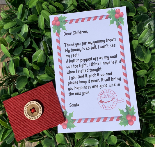 Santa’s lost button with personalized letter